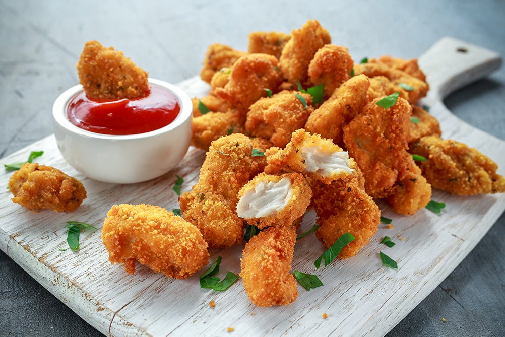 Poulet-Flügeli und Poulet-Nuggets 